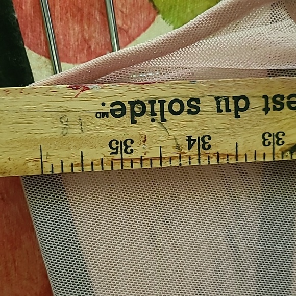 Dusty rose poly spandex  creates a lovely designer dress. I wish it fit me! - Picture 12 of 12